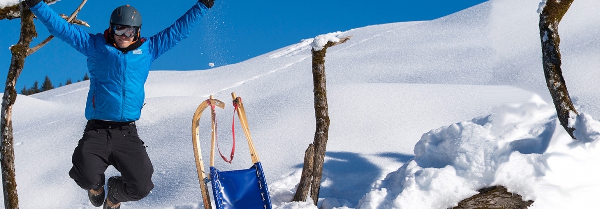 Rodler im Schnee am Hocheck in Oberaudorf